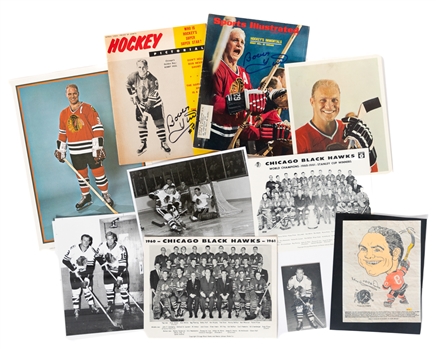 Bobby Hull Memorabilia Collection of 8 including 1970-71 Kelloggs Sporticatures Iron-on Transfer and Signed Magazines (2)