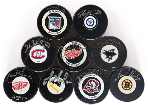 Hockey Hall of Famers and Stars Signed Puck Collection of 37 Including Gretzky, Lemieux, Hasek, Hull, Dionne, H. Richard and More - All with Holograms or COAs!