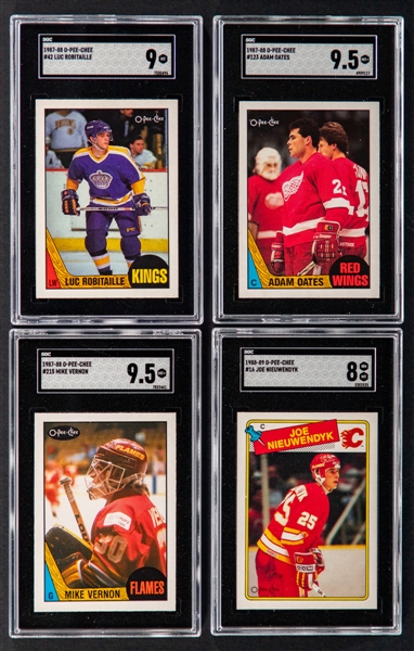 1987-88 and 1988-89 O-Pee-Chee SGC-Graded Rookie Cards (4) Including 1987-88 #42 HOFer Luc Robitaille (SGC 9), 1987-88 #123 HOFer Adam Oates (SGC 9.5) and 1987-88 #215 HOFer Mike Vernon (SGC 9.5)