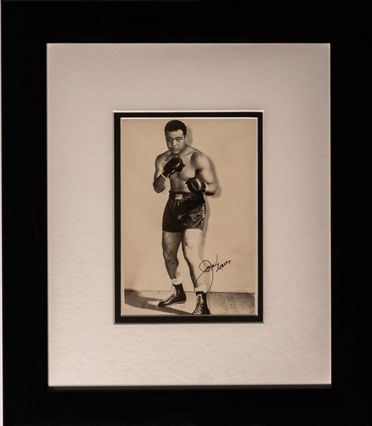 Former Heavyweight Boxing Champion Deceased HOFer Joe Louis Signed Framed Photo with JSA Auction LOA (13" x 15")