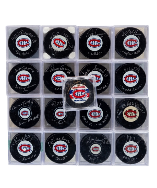 Montreal Canadiens "Nicknames" Signed Puck Collection of 17 Including HOFers Savard, Moore, Chelios, Robinson, Carbonneau and Others - All Inscribed! - Most with COAs!